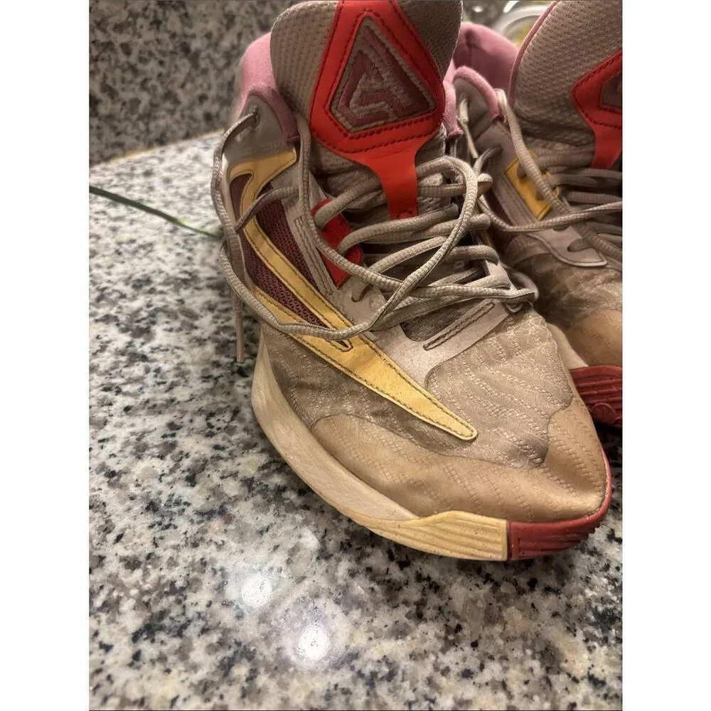 Nike Giannis Immortality 3 Neutral-Tone Athletic Sneakers with Pink Accents